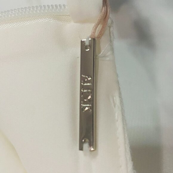 Stasia Alexis Design Sleeveless White Dress for Glamorous Occasions - Picture 10 of 17